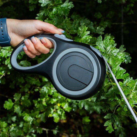 laisse pour chien retractable Premium gris mains plante