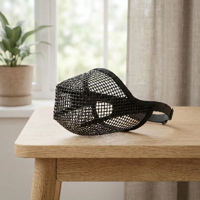 museliere chiot protection superieur noir sur table