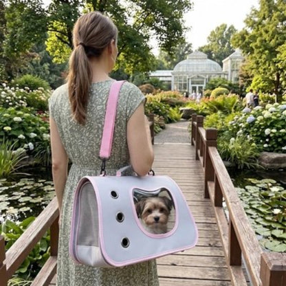 Sac de transport pour Chien rose sur épaule jeune dame